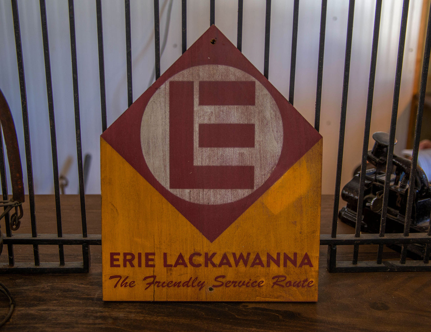 Erie Lackawanna "The Friendly Service Route" Advertising wood sign. Distressed.